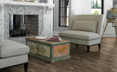 flooring in living room with fireplace